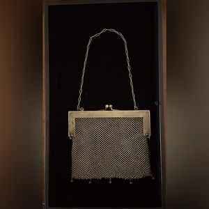 Very old vintage Victoria silver mesh purse bag. Excellent condition.